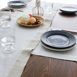 Camino de mesa de lino con borde de color